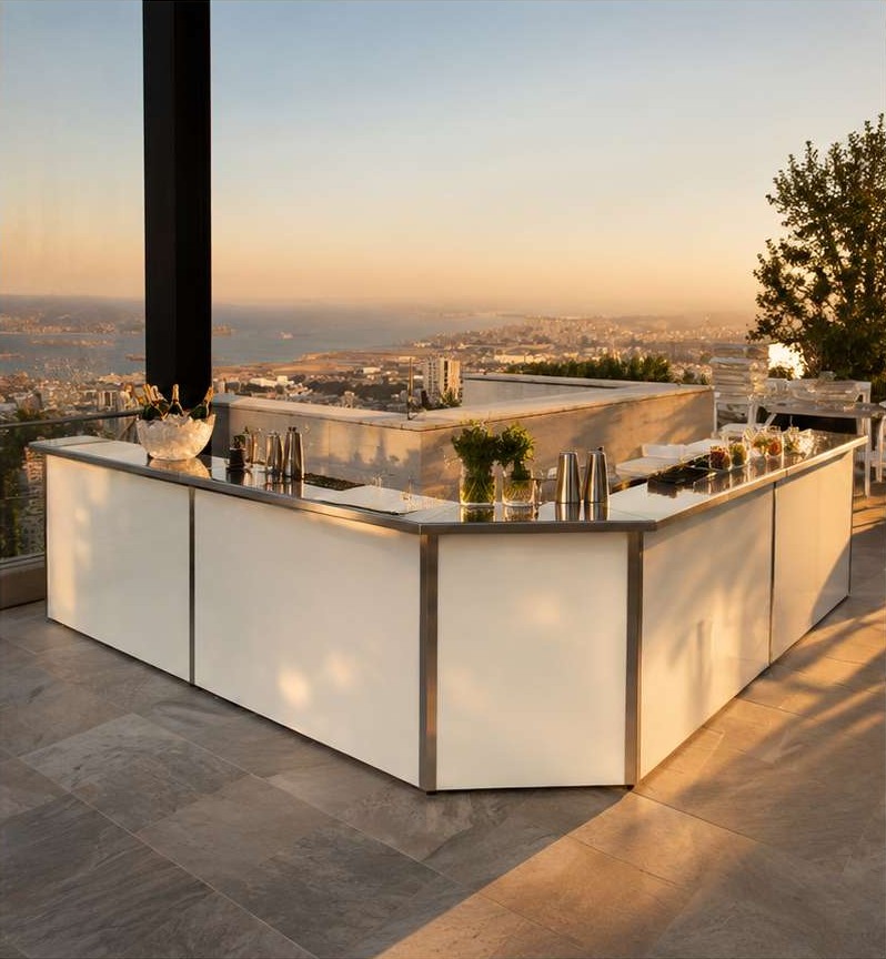 Ivory bar arranged on a terrace at sunset